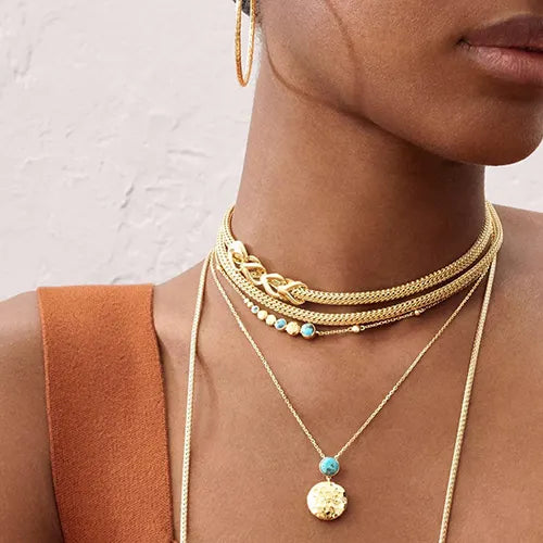 Layers, Chains, and Pearls: Here Are Fall’s Hottest Neckline Looks