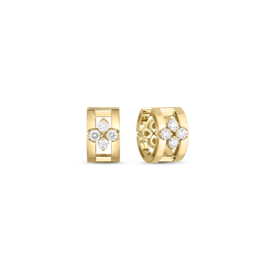 Gold hoop earrings with diamond accents on a white background
