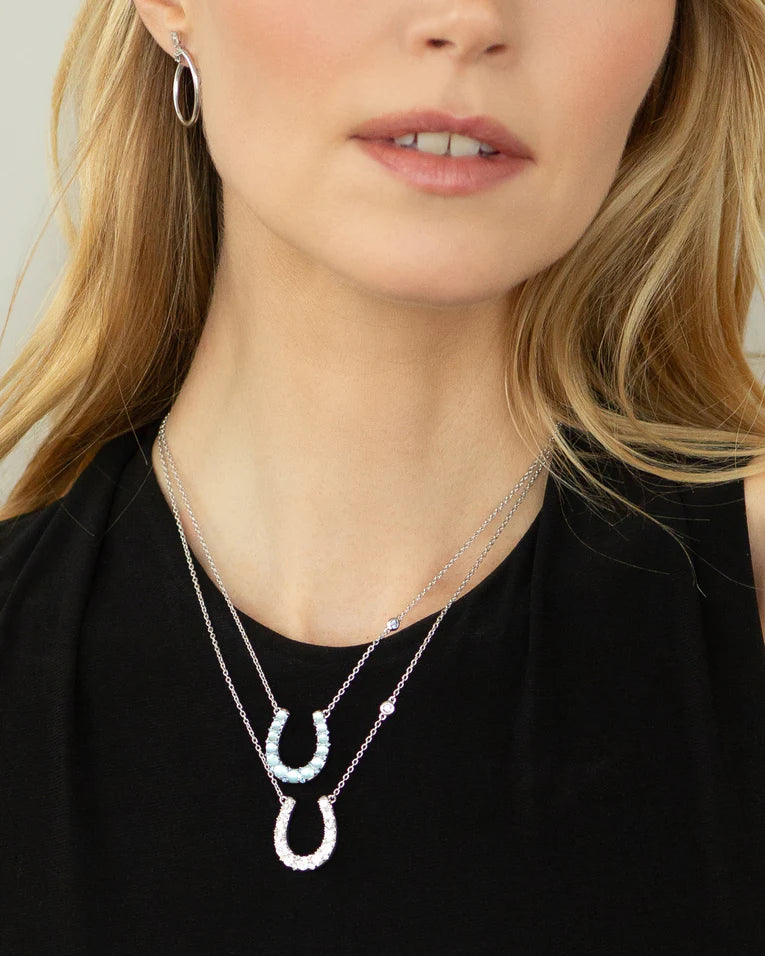 2.56ct Blue Sapphire, 2.29ct Blue Topaz and Mother of Pearl Horseshoe Pendant in Sterling Silver, 18" chain