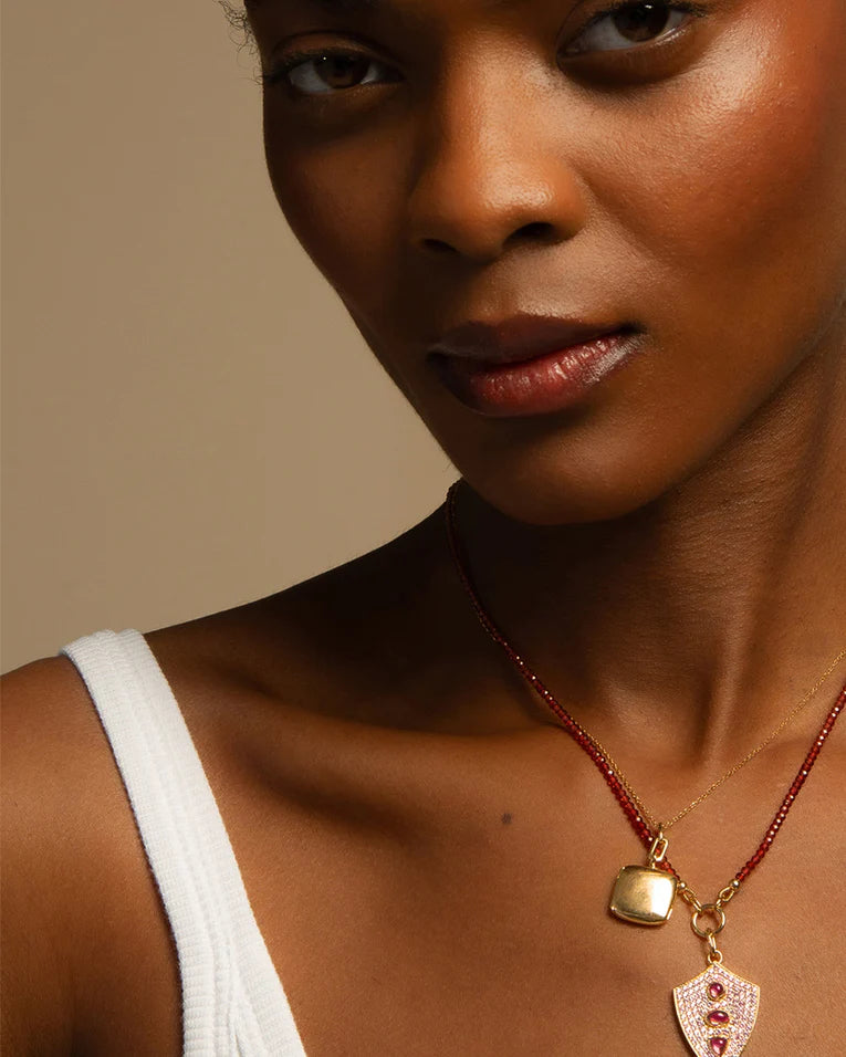 31.84ct Garnet, 1.44ct Pink Sapphire and 1.02ct Rhodolite "Fearless" Shield Necklace in 18K Yellow Gold, 18" chain