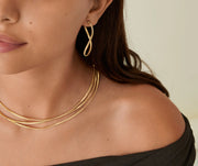 Marrakech Twisted Oval Hoop Earrings in 18k Yellow Gold