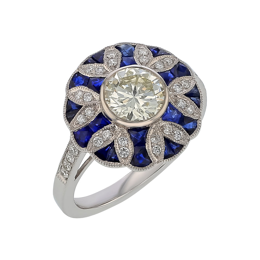1.01ct Round Center Diamond, 0.21ct Diamond and 1.10ct Sapphire Round Ring in Platinum, size 6.5
