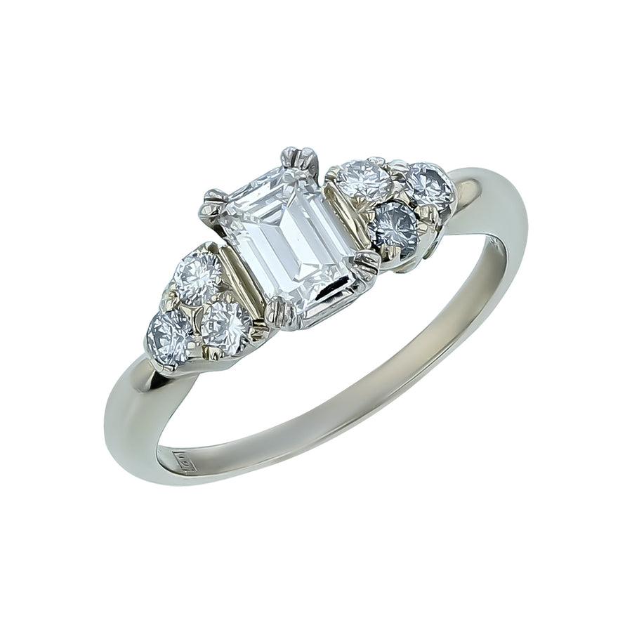 0.65ct Emerald Cut Diamond and 0.25ct Round Diamond Ring in 18K White Gold, size 6