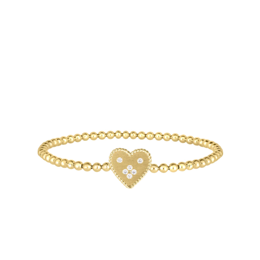 This Roberto Coin Venetian Princess Heart Bracelet is crafted from 18K Yellow Gold and features 0.08ct Diamond.