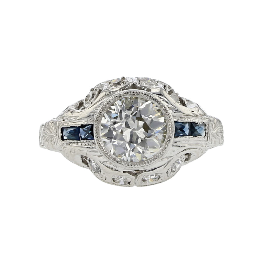 Platinum Round Brilliant Diamond and Sapphire Ring
